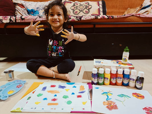 Kid loves to do finger painting