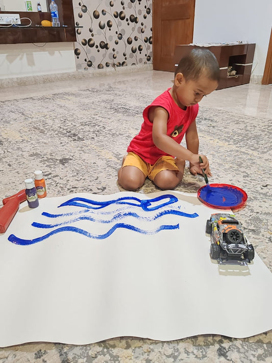 Kid loves to do finger painting